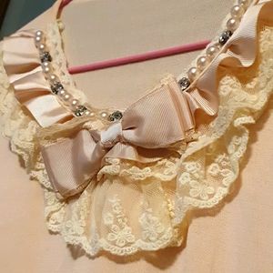 Elegant top with pearls,lace and ribbon